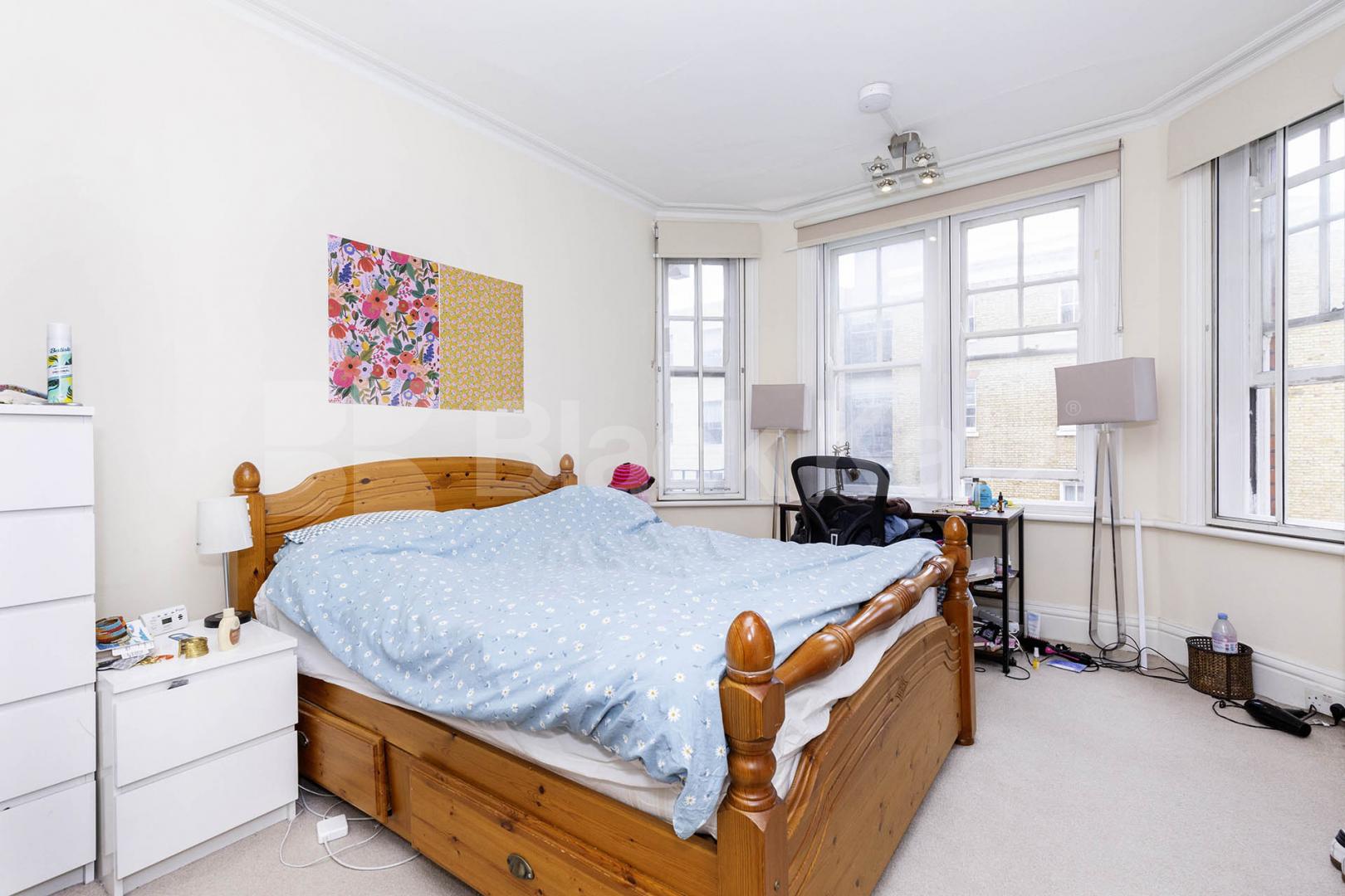 Three double bedrooms, two bathrooms, high ceilings and a spacious lounge. Melcombe Court, Dorset Square, Baker Street